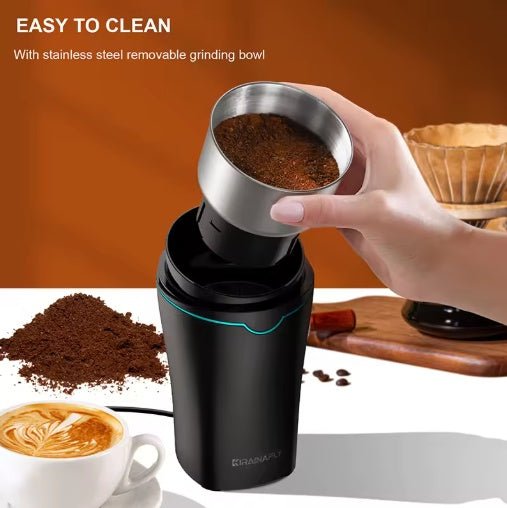 Stcraftdigital professional coffee grinder with stainless steel cup for coffee beans, spices, herbs, and grains in a kitchen setting.